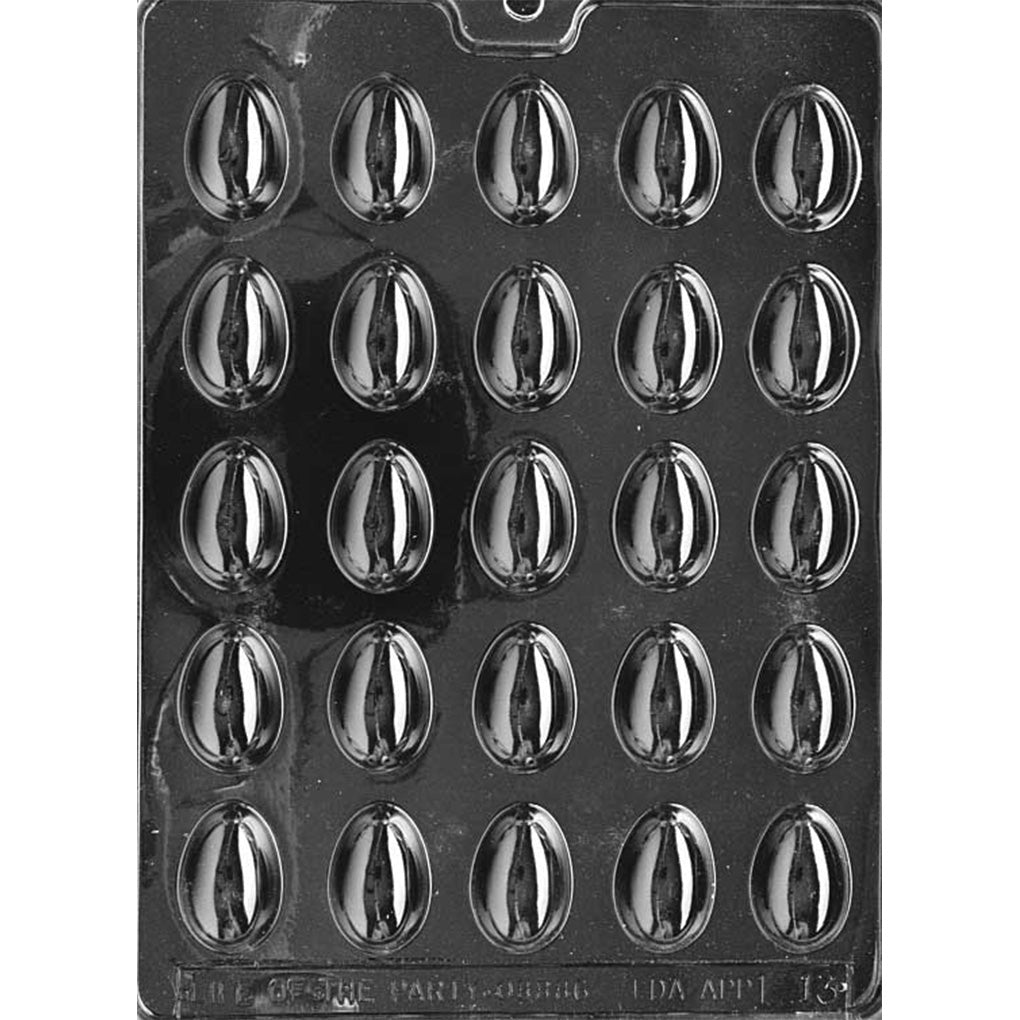 Clear plastic small Easter egg chocolate mold shown on a black background, with a grid of smooth oval egg cavities featuring a defined center ridge line.