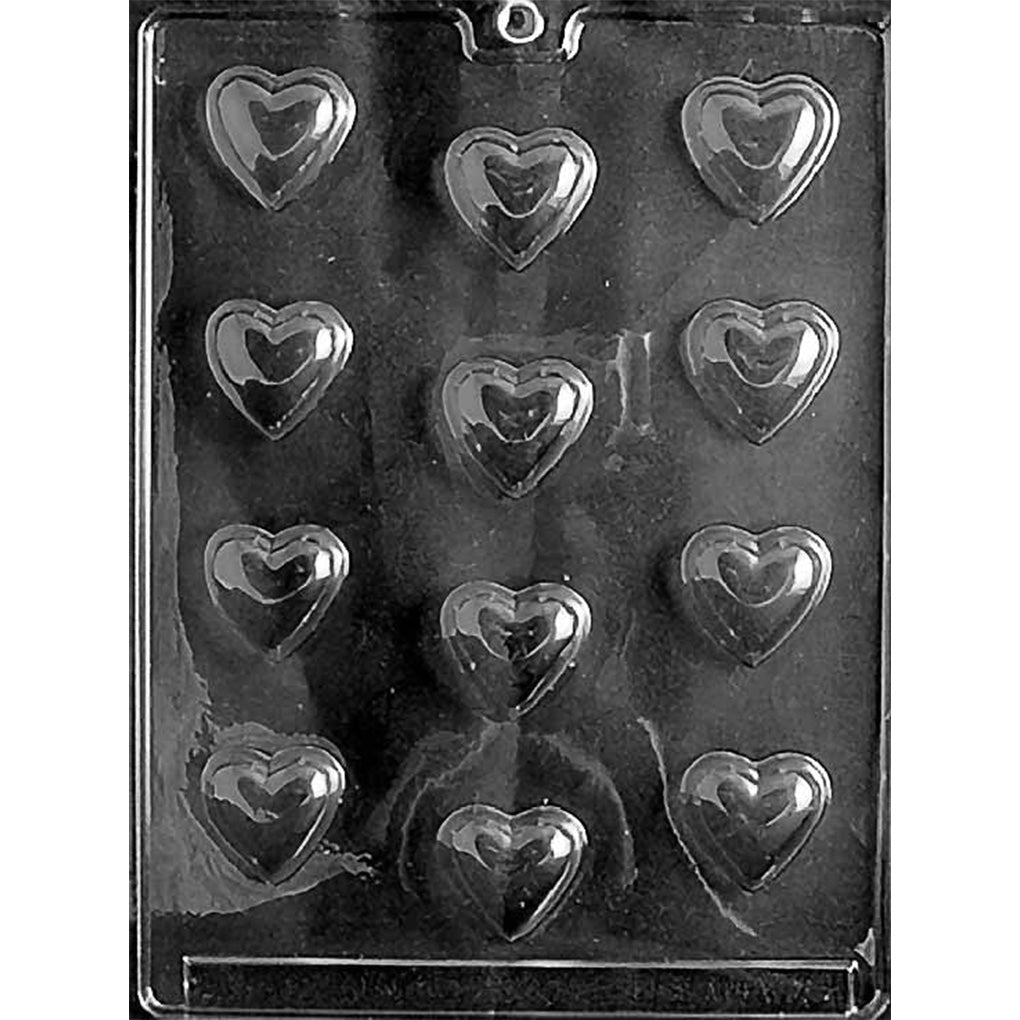 Small hearts chocolate mold with 12 heart-within-a-heart cavities, each measuring approximately 1 1/4" x 1 1/2" x 3/8" deep