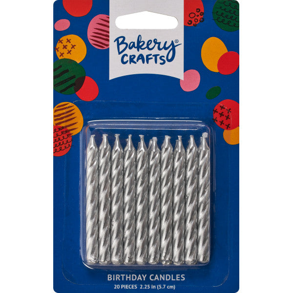 Package of 20 silver spiral cake candles in clear plastic packaging with blue and colorful background.