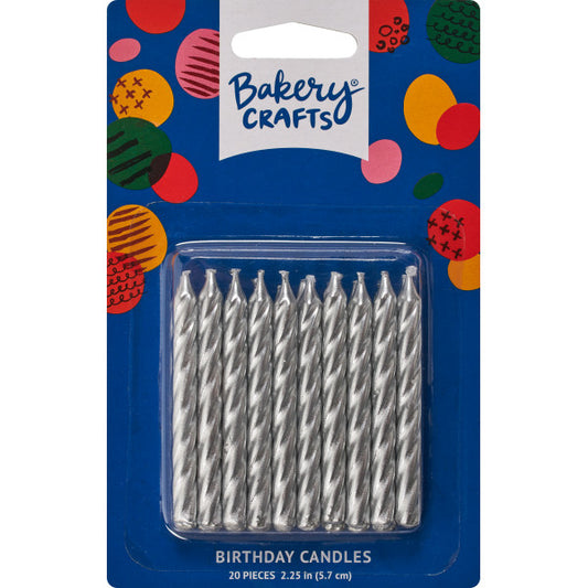 Package of 20 silver spiral cake candles in clear plastic packaging with blue and colorful background.