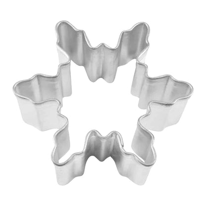 Small snowflake-shaped cookie cutter with fluted edges.