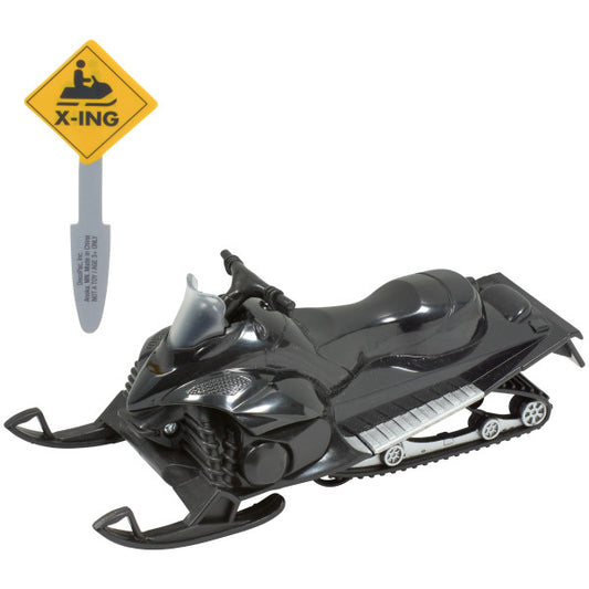 Black snowmobile cake topper figurine with a small yellow snowmobile crossing sign labeled “X-ING,” shown on a white background.