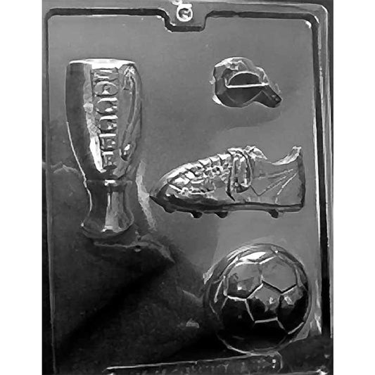 Four-cavity soccer assortment chocolate mold with a championship trophy, referee whistle, laced cleat with studs, and paneled soccer ball
