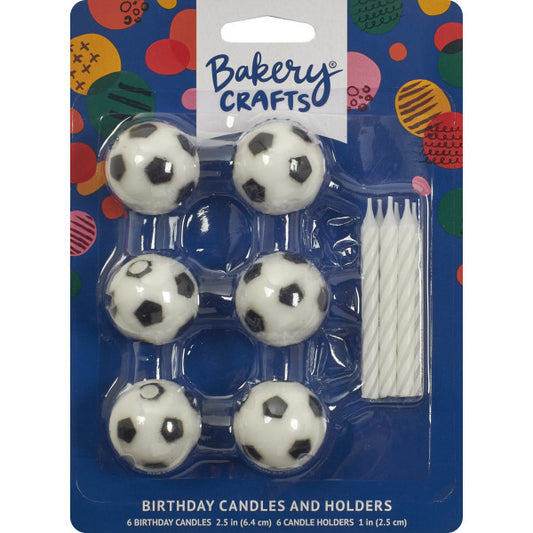 Package of 6 soccer ball birthday candle holders with 6 white spiral candles.