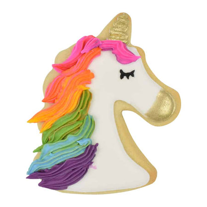 Decorated unicorn cookie with a multicolored rainbow mane, gold horn, and white icing base.