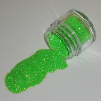Neon green Galaxy Glitter Dust pouring from a jar, glowing with intense brightness and iridescent sparkle.