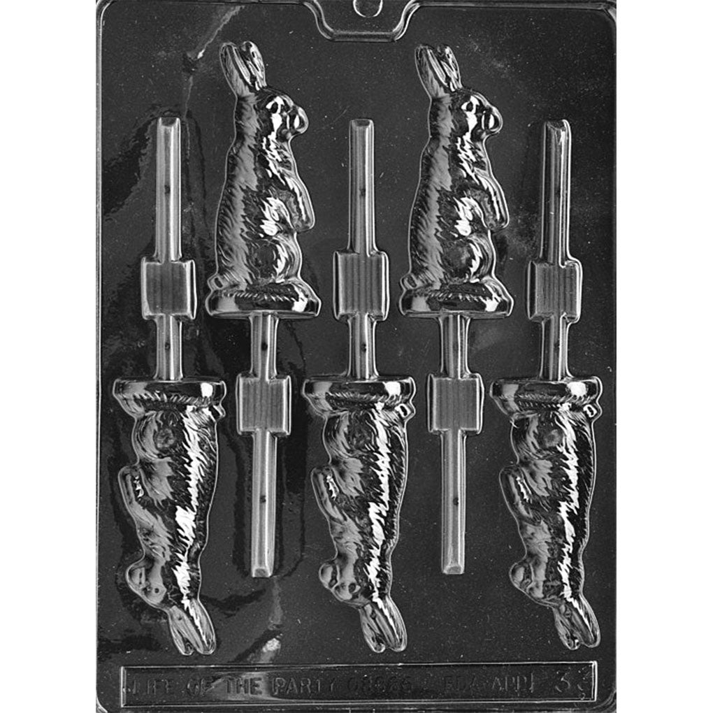 Clear plastic chocolate lollipop mold with standing rabbit cavities, showing a side-profile bunny with raised fur texture and built-in stick slots on a dark background.