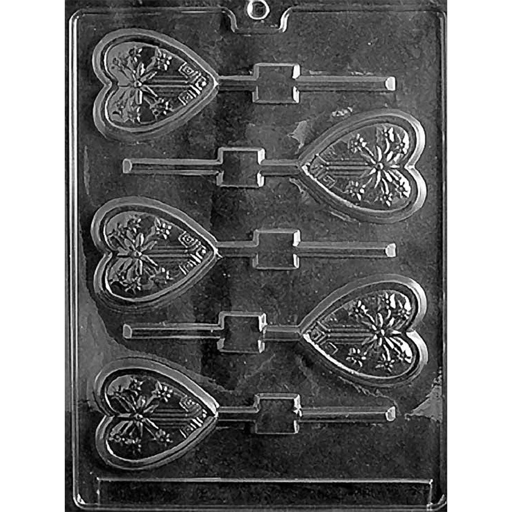 Clear plastic chocolate lollipop mold with six heart-shaped cavities featuring an embossed starburst pattern and stick channels for making heart chocolate pops.