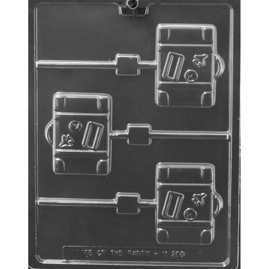 Clear plastic chocolate lollipop mold with three suitcase-shaped cavities featuring raised travel-style accents and side handles.