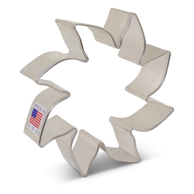 3 1/2-inch sun-shaped cookie cutter made from sturdy tin, perfect for creating sunny cookies for summer parties. Made in the USA.