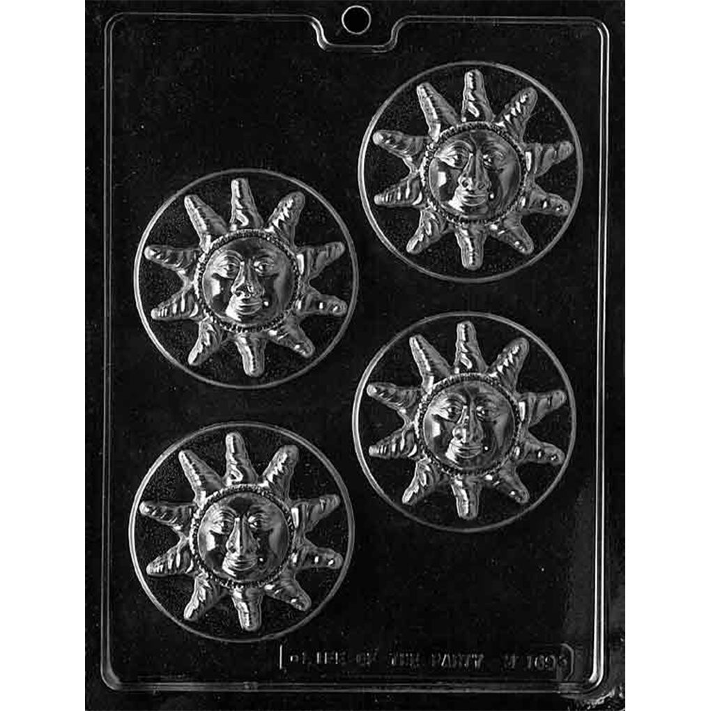 Clear plastic sunface chocolate mold with four round cavities, each showing a detailed face surrounded by raised sun rays inside a circular border, on a dark background.