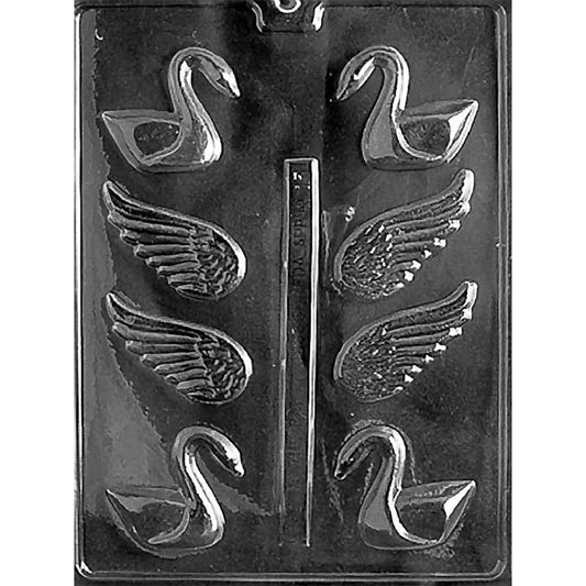 Clear plastic 3D chocolate mold photographed on a black background with cavities for small swan bodies and separate feathered wing pieces, arranged in two columns.