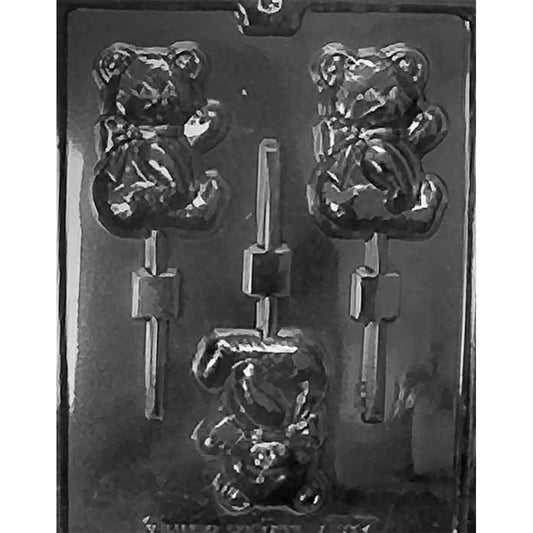 Chocolate lollipop mold with three seated teddy bear cavities arranged in alternating directions with molded stick channels.