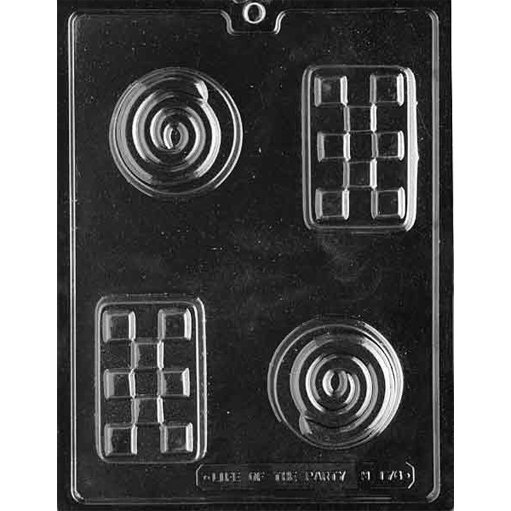 Clear chocolate mold with four patterned cavities on a dark background, including two rectangular checkerboard bar shapes and two round spiral swirl designs.