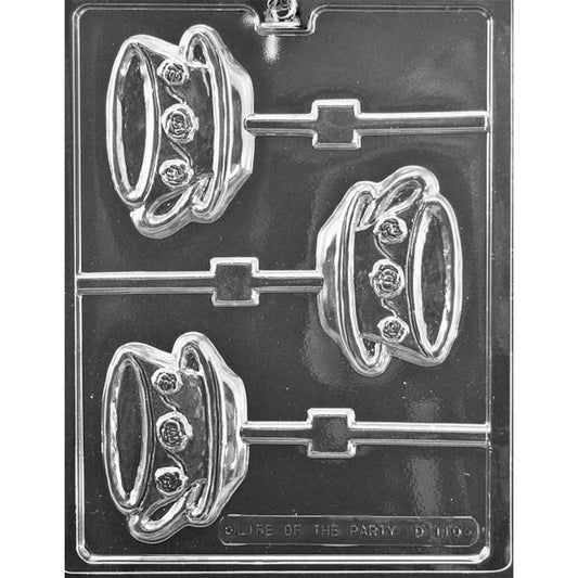 Clear plastic chocolate lollipop mold with three teacup-and-saucer cavities, each showing a cup with handle and raised accents plus a straight lollipop stick channel.