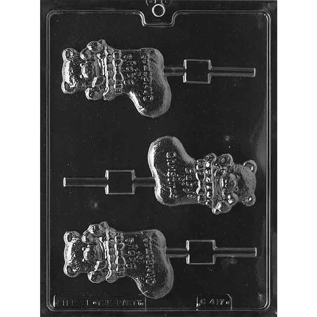Three-cavity teddy bear in a stocking chocolate lollipop mold with “Baby’s 1st Christmas” lettering, approximately 3 5/8 x 2 3/8 x 3/8 inches deep