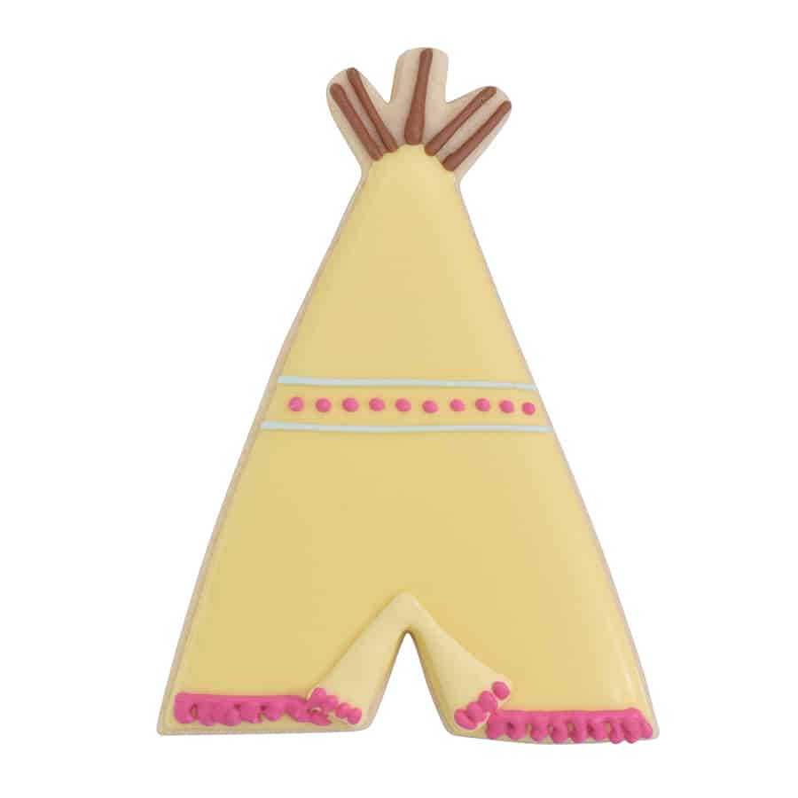 Decorated teepee cookie with yellow icing, brown poles, and pink and white detailing.