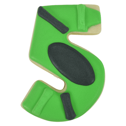 Decorated Number 5 cookie with green and black icing, designed as a sports field.