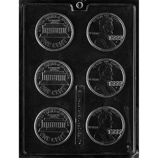 Clear Year 2000 Pennies Chocolate Mold photographed against a black background, featuring six round cavities with raised Lincoln penny designs showing the front and back of the coin.