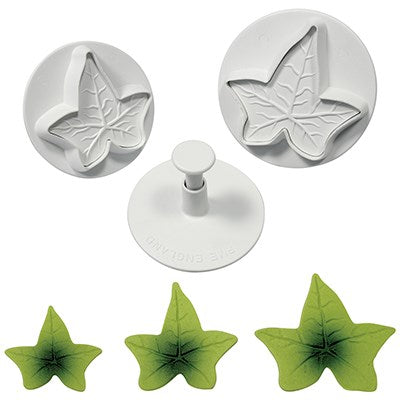 Three ivy leaf plunger cutters with matching green sugar paste leaves