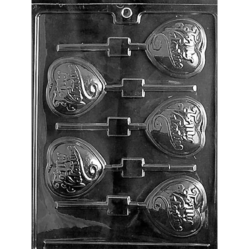 “To My Valentine” heart chocolate lollipop mold on dark background, showing six heart pops with embossed script and scroll details for Valentine candy making.