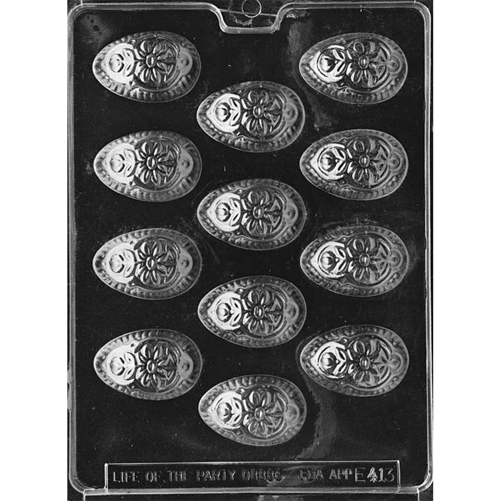 Clear plastic chocolate mold tray with 12 oval mini egg cavities, each featuring an embossed floral pattern and scalloped border for Easter chocolates.