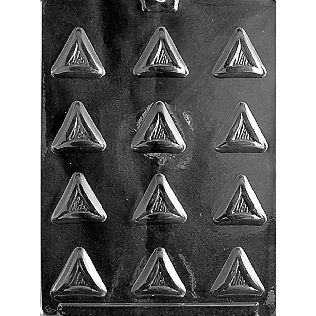 Plastic chocolate mold sheet with twelve small triangle-shaped cavities arranged in a grid.