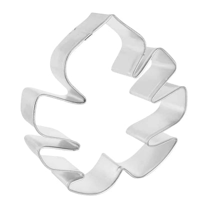 Side view of a tropical leaf-shaped cookie cutter, showing its sturdy construction and curved details.