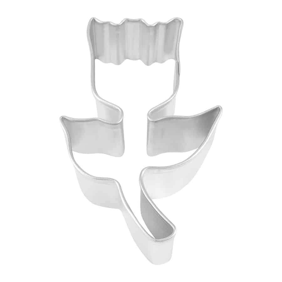 Metal tulip-shaped cookie cutter with a defined bloom, stem, and leaves, photographed from a top-down view against a white background.