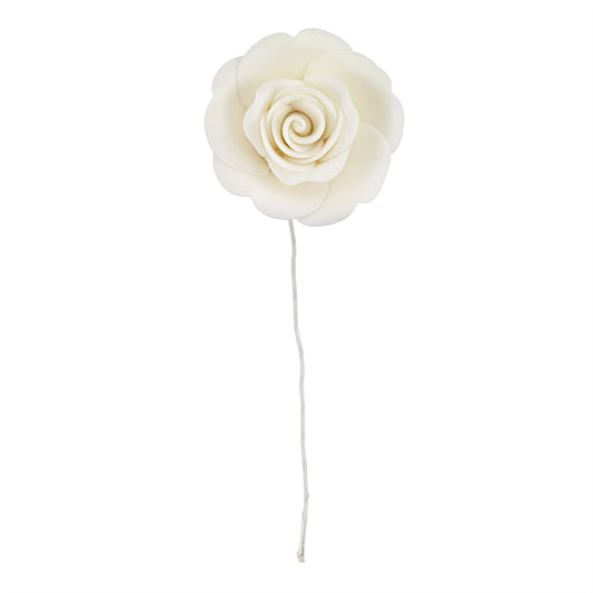 White gum paste garden rose with lifelike petals and wire stem, approximately 2 inches wide, for decorating wedding and special occasion cakes.