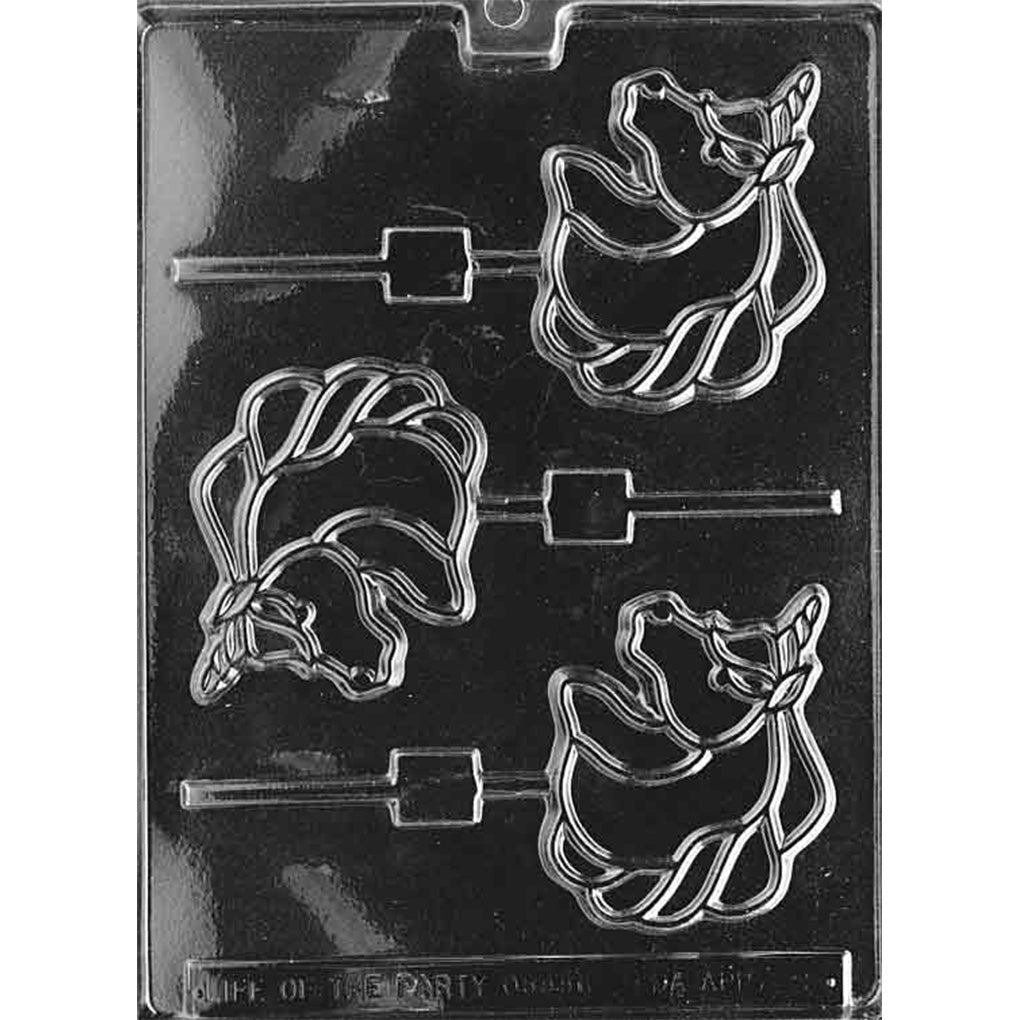 Clear plastic unicorn silhouette chocolate lollipop mold with three cavities showing a unicorn outline with flowing mane and tail linework, each with a stick channel, on a dark background.