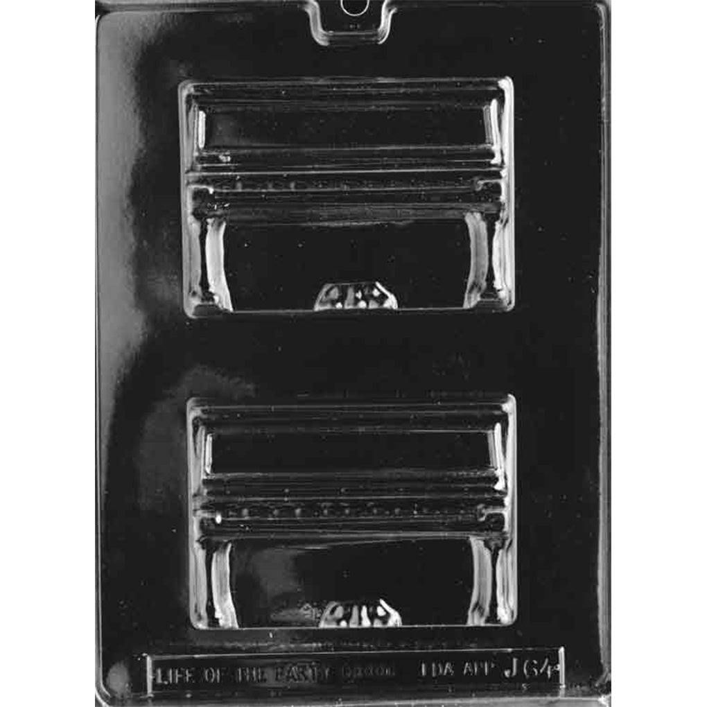 Two-cavity upright piano chocolate mold with detailed keyboards, piano legs, and pedals; each cavity uses approximately 4.4 oz of chocolate