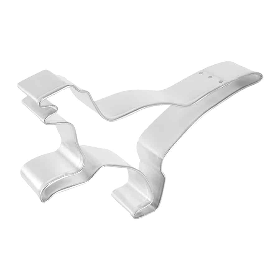 Angled side view of the Velociraptor cookie cutter, displaying its sturdy metal construction with raised edges for a comfortable grip. The cutter’s intricate shape, including the raptor’s outstretched limbs and curved claws, is clearly visible, designed to create detailed dino cookies for birthdays, fossil parties, and Jurassic-inspired treats.