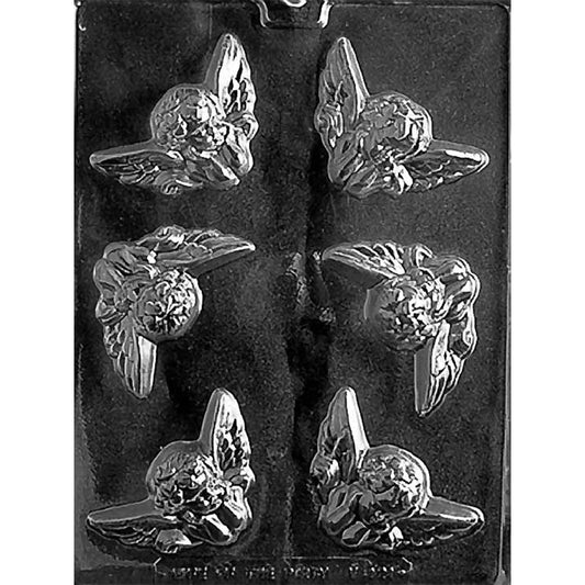 Clear plastic chocolate mold with six cherub-shaped cavities featuring winged figures and curled hair, photographed on a dark background.