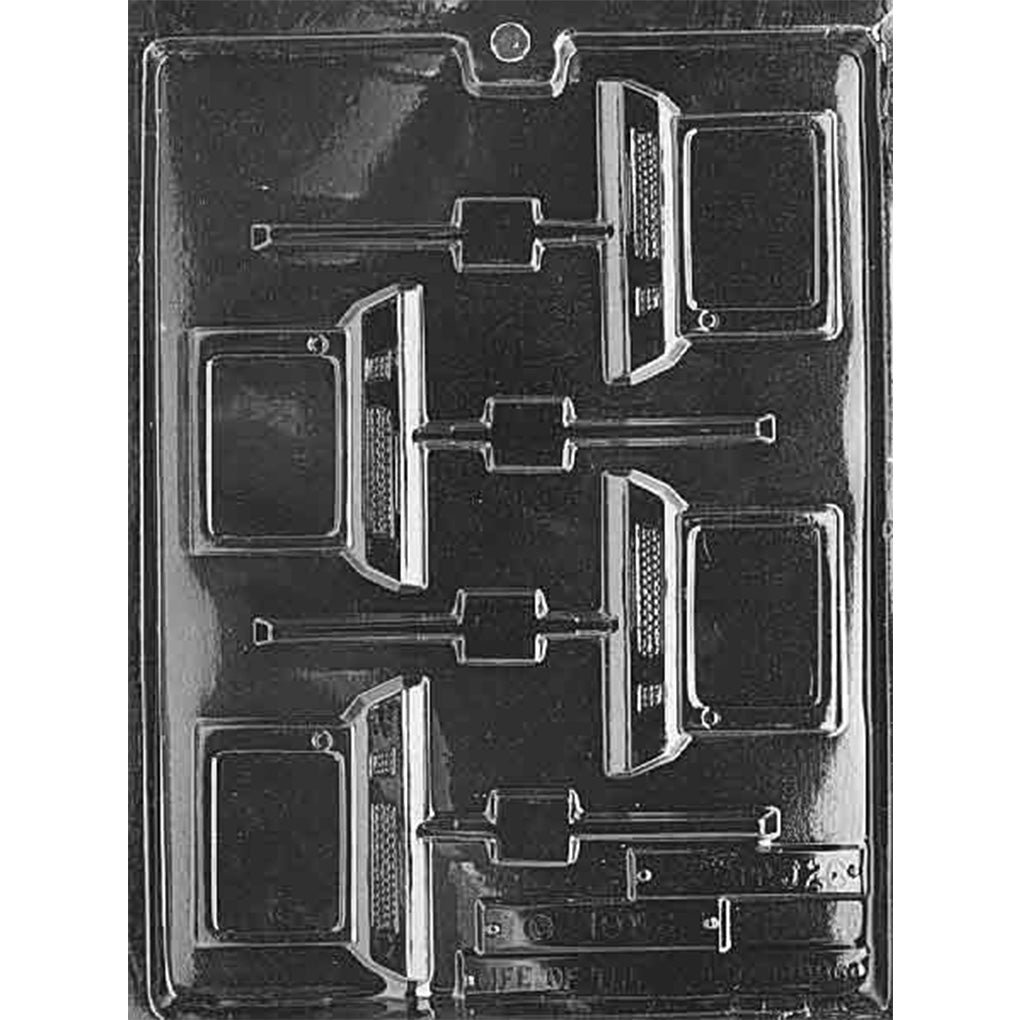 Four-cavity vintage desktop computer chocolate lollipop mold with boxy CRT-style monitors, keyboard panels, blank screens, and stick channels