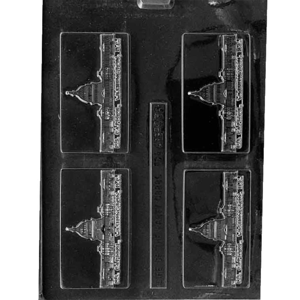 Clear plastic chocolate bar mold with four rectangular cavities showing a raised U.S. Capitol building silhouette and the text “U.S. Capitol, Washington D.C.” inside a framed border on a dark background.