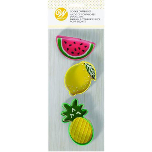 Wilton tropical fruit cookie cutter set in packaging, featuring pineapple, watermelon, and lemon shapes.