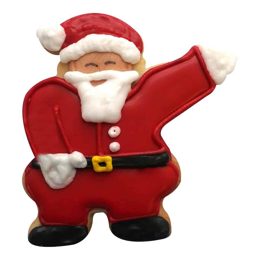 Decorated Santa-shaped cookie with red icing, a fluffy white beard, and a waving arm, made using a Santa waving cookie cutter.