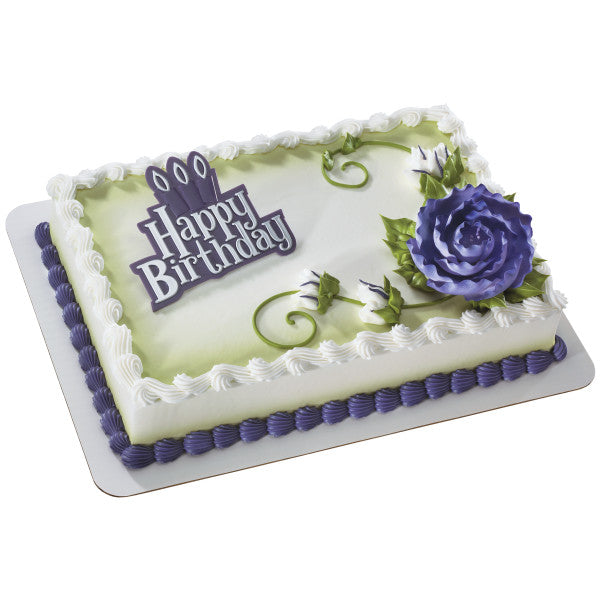 Rectangular birthday cake with purple borders, green airbrush, and purple gum paste rose topper