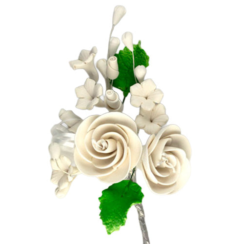 White dog rose gum paste flower spray with two ivory rose blooms, white filler flowers, green leaves, and buds on wired stems.
