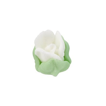 Mini white royal icing rosebud with green leaves, delicate sugar flower decoration.