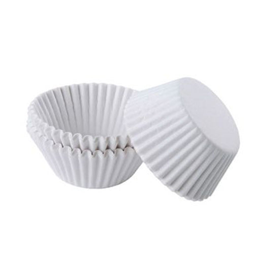 Stack of white fluted candy cups (Size #5) on a white background.