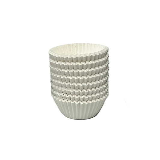 Stack of white paper candy cups with fluted, accordion-fold sides.