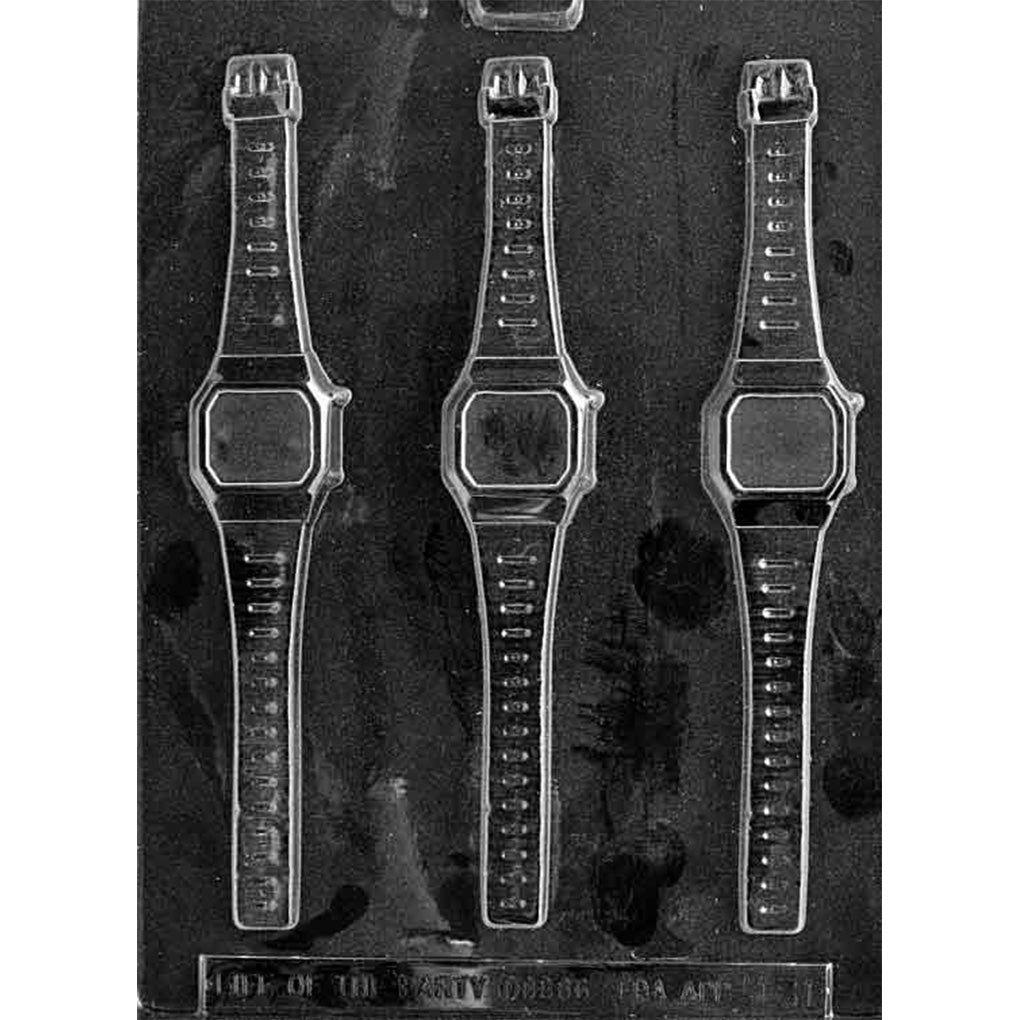 Clear chocolate mold with three long wristwatch-shaped cavities featuring rectangular watch faces, narrow bands, strap markings, and buckle-style ends.