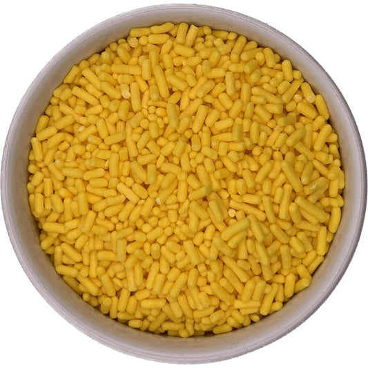 Top-down view of a round container filled with bright yellow jimmies sprinkles, showing the small rod-shaped pieces packed closely together.