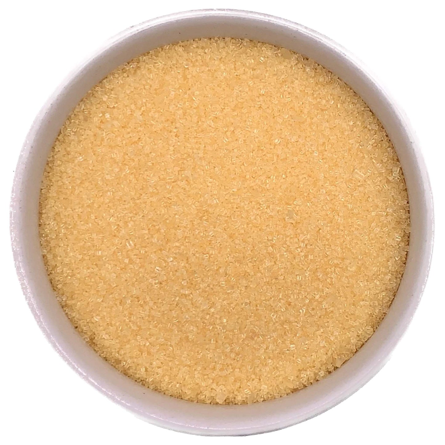 Top-down view of a white bowl filled with yellow fine sanding sugar, showing tiny golden-yellow crystals with a soft, shimmering texture.