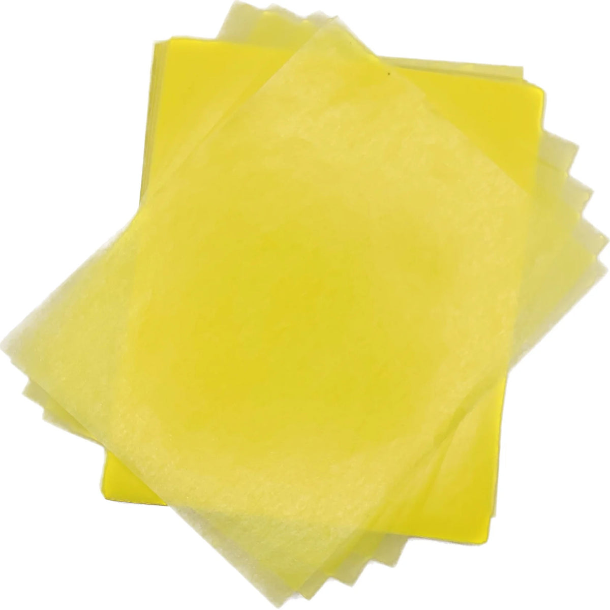 Overlapping stack of bright yellow 4" x 5" wax caramel and taffy wrapper sheets arranged on a white background.