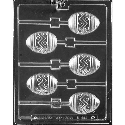Clear plastic chocolate lollipop mold with five egg-shaped cavities featuring zigzag bands, raised dots, striped accents, and individual stick channels.