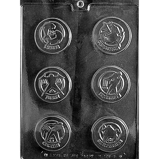 Clear chocolate mold with six round zodiac medallion cavities featuring raised Pisces, Capricorn, Libra, Aquarius, Gemini, and Sagittarius symbols and names.
