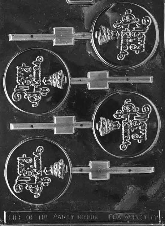 Clear plastic candy mold with four round lollipop cavities featuring ornate “Merry Christmas” lettering and a small Christmas tree; built-in stick channels. Keywords: Merry Christmas lollipop mold, holiday chocolate mold, Christmas candy mold.